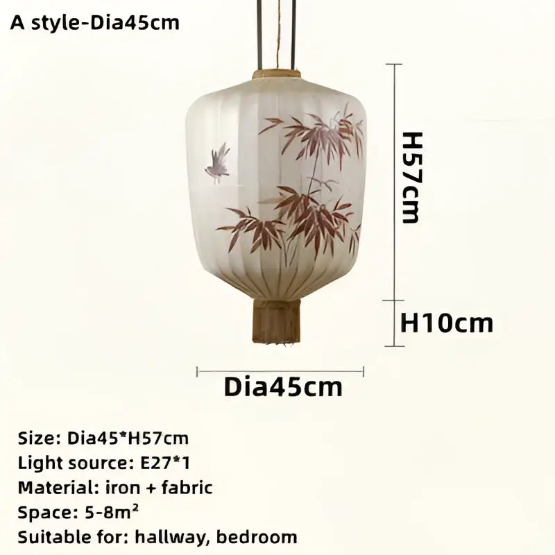 Japanese lantern painting with white peach fabric body framed by iron featuring brown bamboo and bird motifs for dining room light