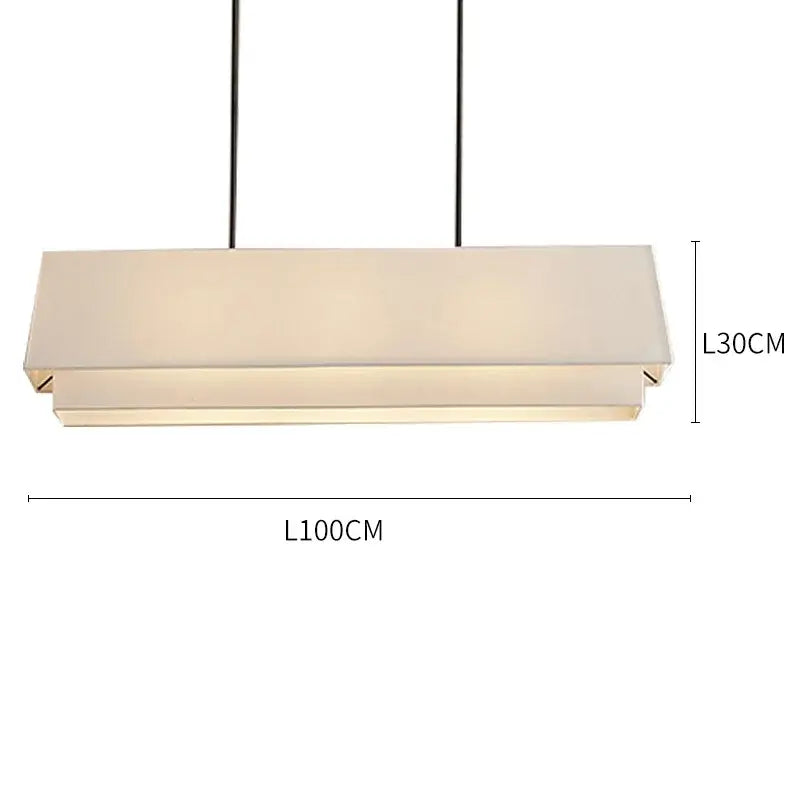 Modern japanese minimalist cream tiered pendant lamp with off-white fabric diffuser and thin black cords by decorbites camden