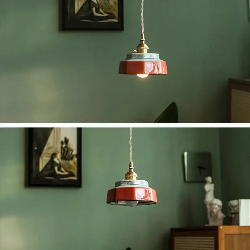 Red ceramic pendant light with brass fixture and patterned accents for Japanese retro dining room use