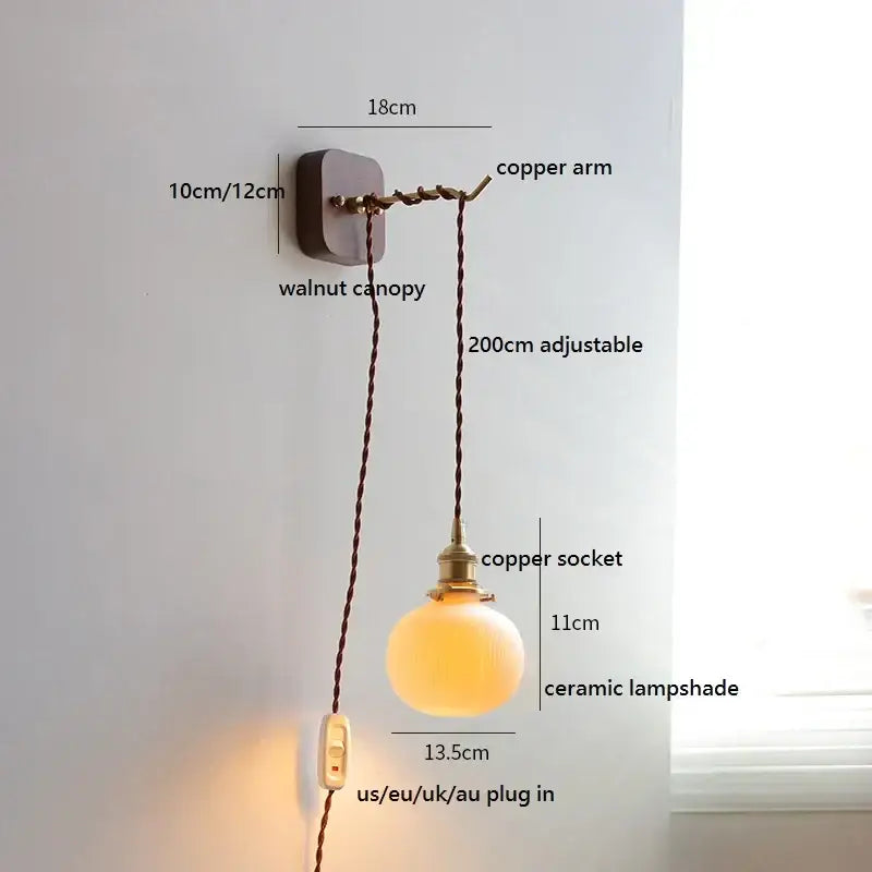 Japanese ribbed glass ceramic led wall light with warm glowing lampshade and adjustable copper arm on walnut canopy decorbites ceramic led