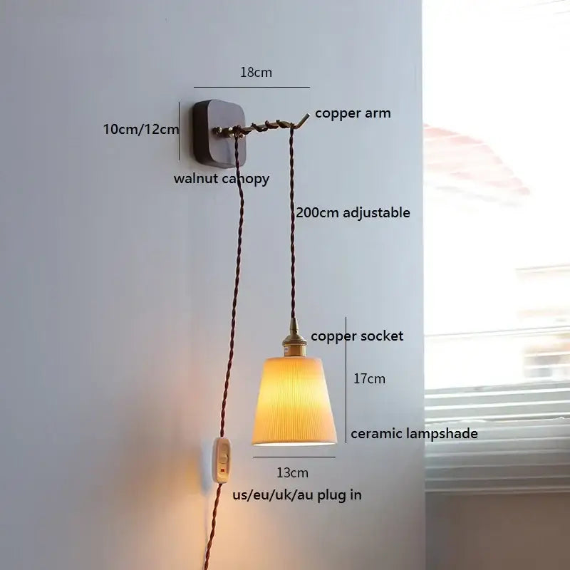 A warm-toned ribbed ceramic led wall light with adjustable copper arm mounted on dark walnut for bedroom decorbites ceramic led