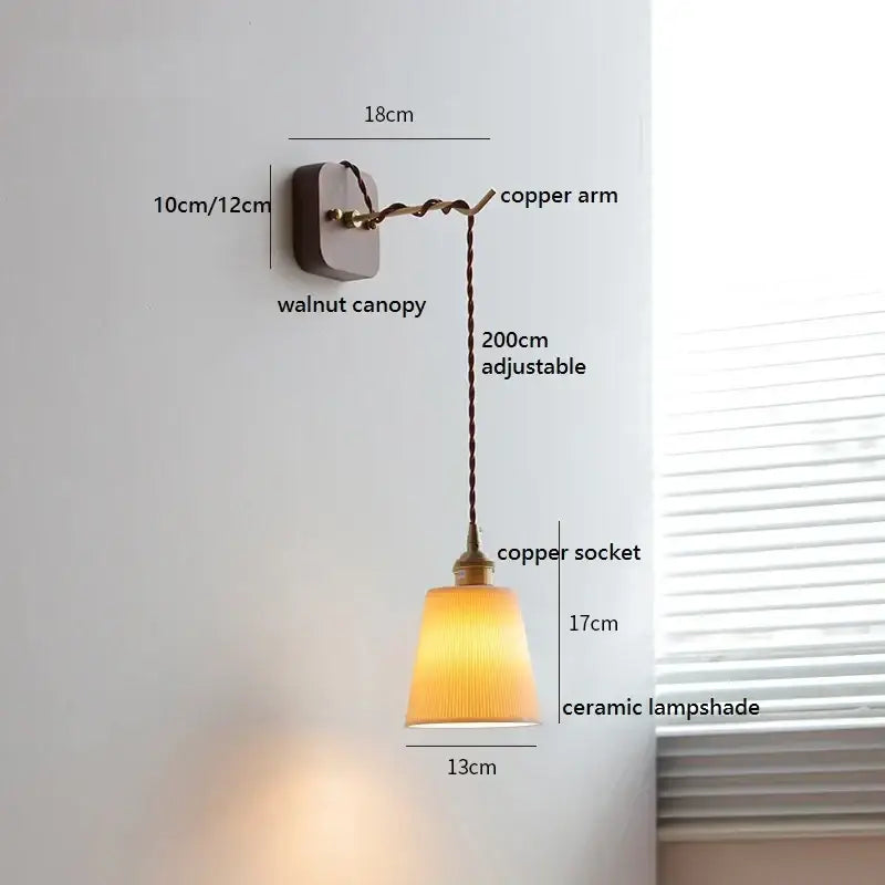 Warm-toned Japanese ribbed ceramic led wall light with twisted copper arm and walnut canopy for bedroom decorbites ceramic led