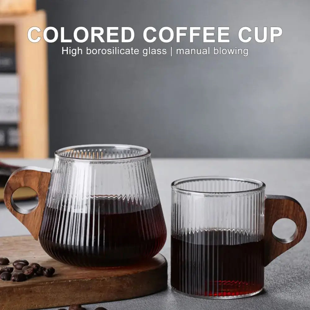 Clear ribbed glass coffee mugs with wooden handles in two sizes ideal for glass coffee or tea use in the kitchen