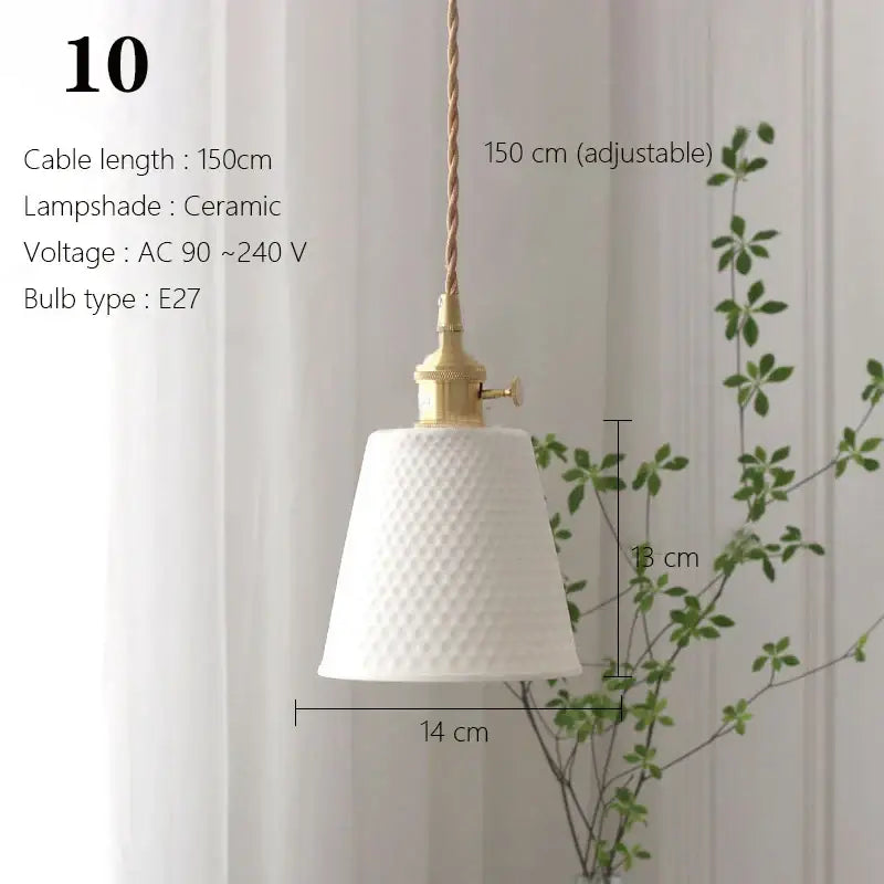 White ceramic pendant light with textured diamond pattern and brass fixture ideal for kitchen or dining room use