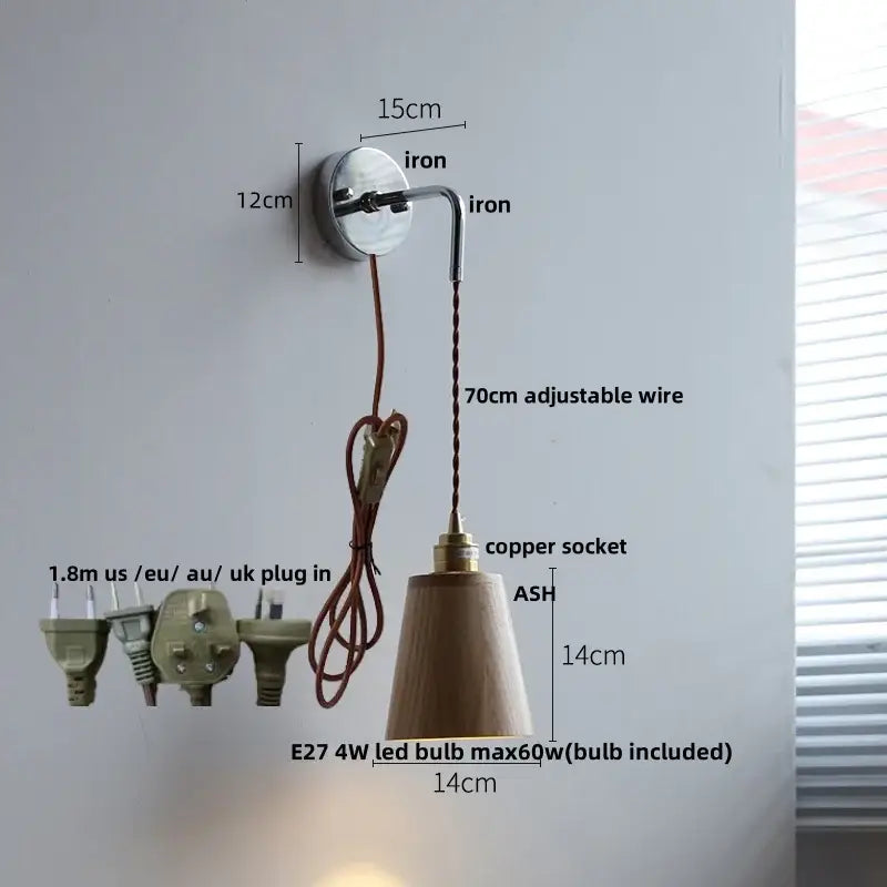 Japanese style black and brass wall lamp with pull chain features polished iron bracket, adjustable copper wire, and ash wood shade