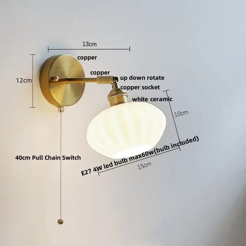 Brass-finished japanese style led wall sconce with white ceramic shade copper hardware and pull chain for bedroom decorbites style