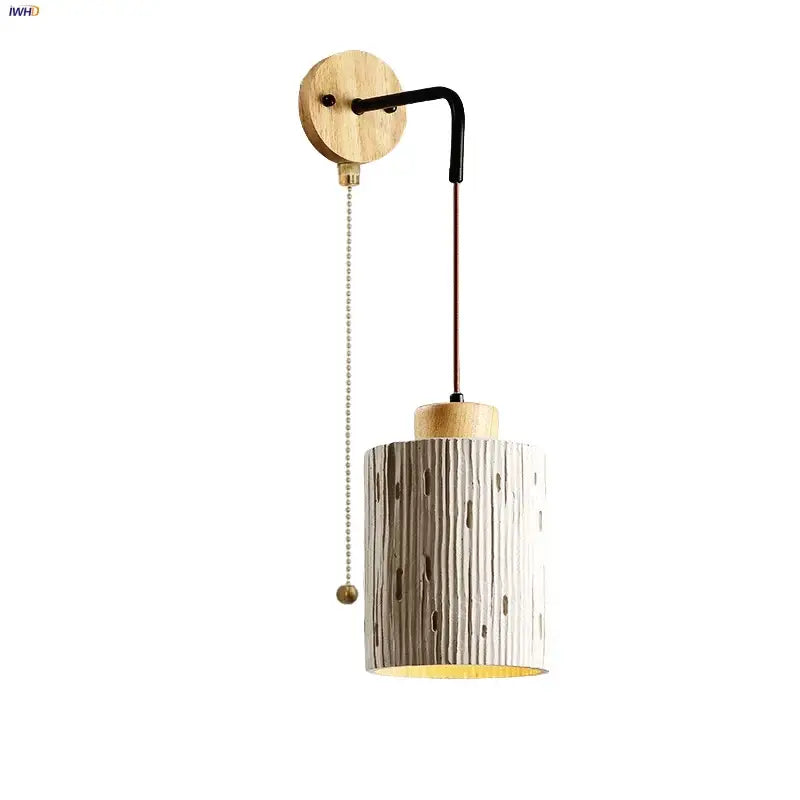 A rustic decorbites japanese style led wood wall light with white and gray textured shade and brass pull chain for bedroom
