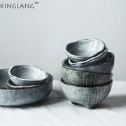 Stylish gray ceramic small sauce dishes with matte finish and vertical ridges stacked as dishes rice bowl set