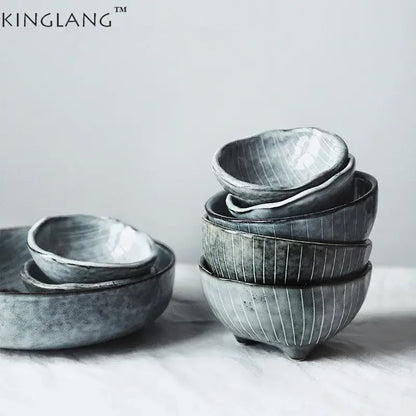 Stylish gray ceramic small sauce dishes with matte finish and vertical ridges stacked as dishes rice bowl set
