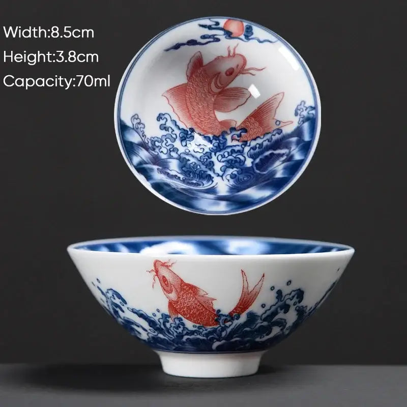 White ceramic kung fu tea bowl with blue and red hand-painted koi fish design from decorbites blue set