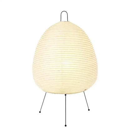 Cream-colored japanese style rice paper table lamp with black metal tripod base by decorbites for bedroom decor