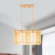 Rectangular rubber wood cuboid cage pendant light with vertical slats and warm finish for dining table lighting
