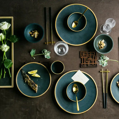 Japanese style deep teal ceramic dinner plate with gold rims and matching golden spoons by decorbites ceramic dinner set