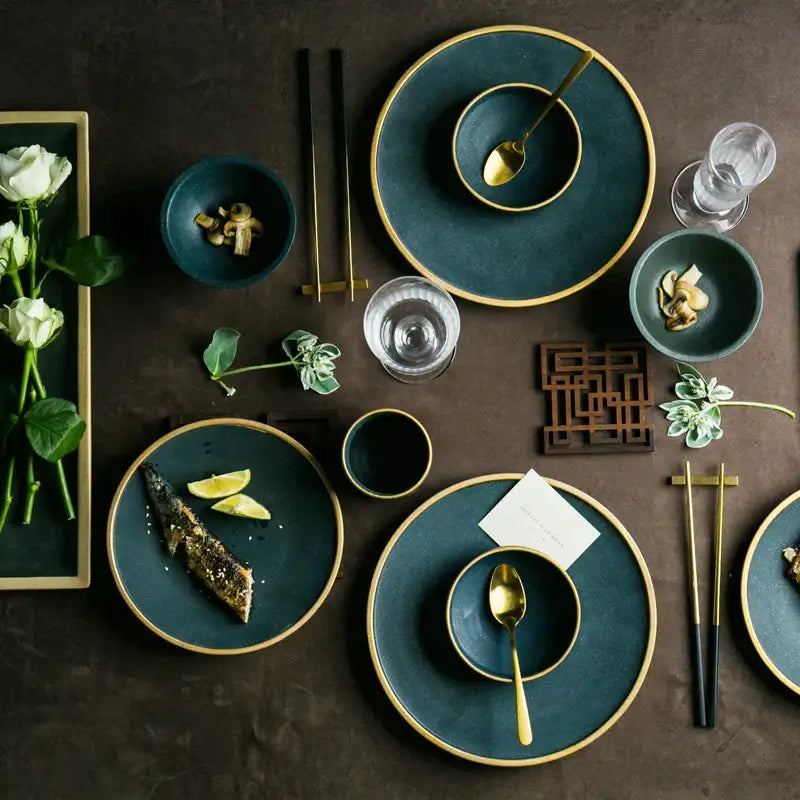 Japanese style deep teal ceramic dinner plate with gold rims and matching golden spoons by decorbites ceramic dinner set
