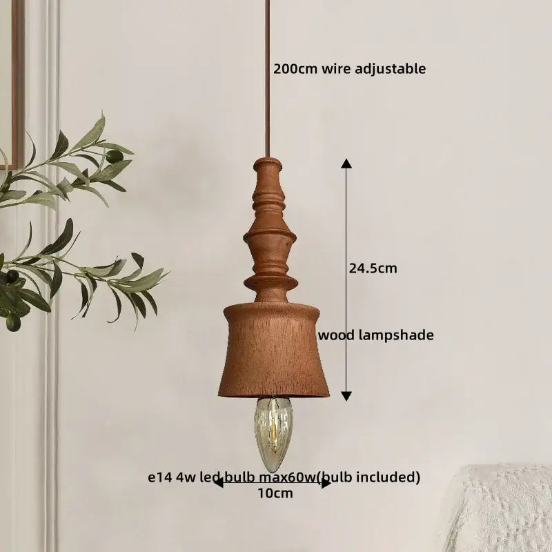 A rustic wooden japanese style pendant light with bell-shaped terracotta ceramic shade and exposed led bulb for dining room decorbites