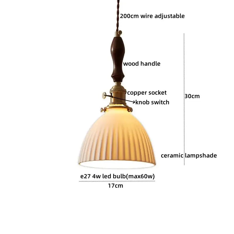 A warm-toned ceramic pendant lamp with vertical ridges, dark wood handle, and brass hardware for dining room decorbites clear glass use