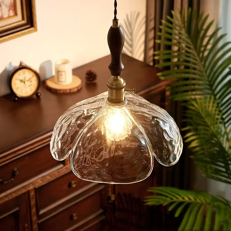 Japanese style clear glass pendant lamp with textured glass, brass fixture, and dark wood pull chain for dining decorbites clear glass decor
