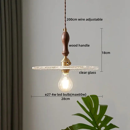 Japanese style clear glass pendant lamp with dark wood handle and brass hardware for dining room decorbites pendant lamp