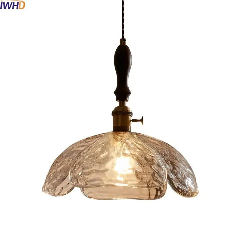 Japanese style clear glass pendant lamp with warm-toned textured glass wood trim and brass hardware for dining room decorbites clear glass
