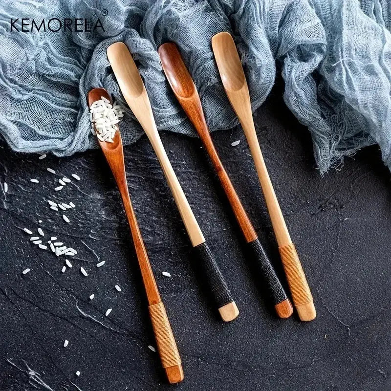Set of three japanese style wooden spoons with natural wood handles and black-wrapped grips by kemorela