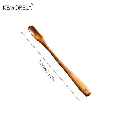 A japanese style wooden tea scoop 20cm with smooth polished finish and ergonomic handle from a wooden spoon set