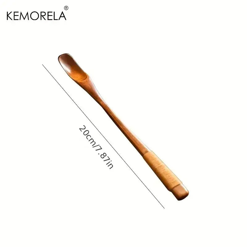 A japanese style wooden tea scoop 20cm with smooth polished finish and ergonomic handle from a wooden spoon set