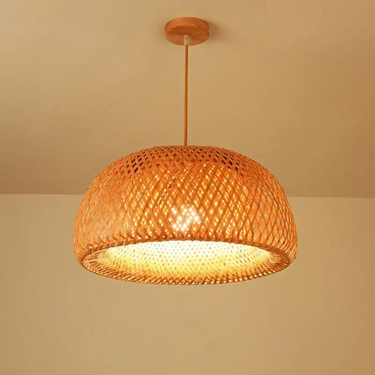 Warm-toned japanese style pendant light with woven bamboo dome shade and wooden ceiling mount for intimate spaces