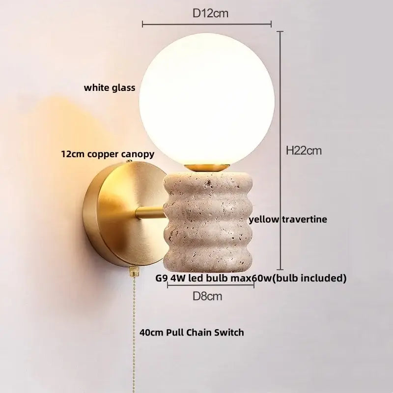 A modern japanese travertine led wall lamp with white glass globe copper canopy and yellow textured base pull chain light