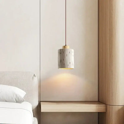 Cylindrical ceramic pendant light with vertical black lines and brass top for bedroom decorbites cement led pendant lights