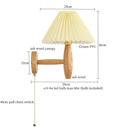 A rustic wall lamp with an ash wood base and cream pvc pleated shade from decorbites cream pvc led collection