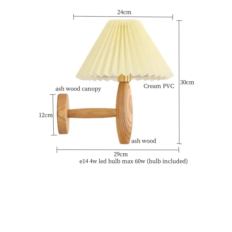 A warm-toned wall lamp with cream pvc led pleated shade, japanese walnut wood canopy, and sturdy wooden base for bedroom decorbites