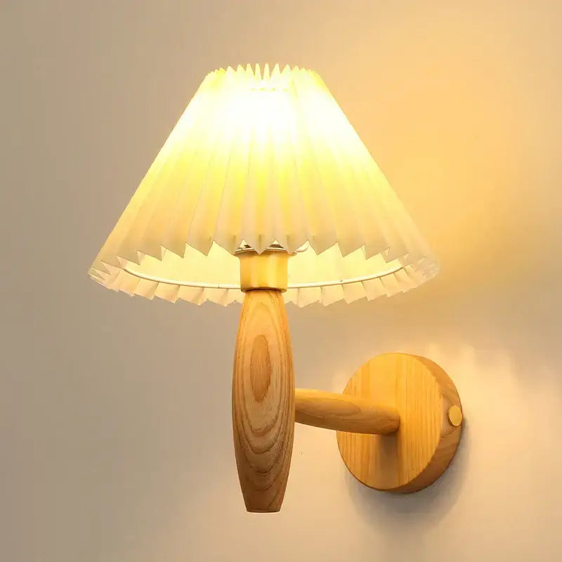 Warm-toned japanese walnut wood wall lamp with cream pvc led pleated translucent lampshade for bedroom decorbites cream pvc