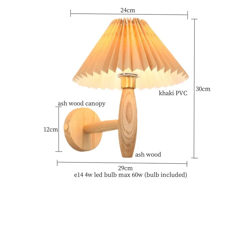 A warm-toned 30cm wall lamp with a pleated cream pvc led shade and ash wood canopy for bedroom decorbites cream pvc lighting