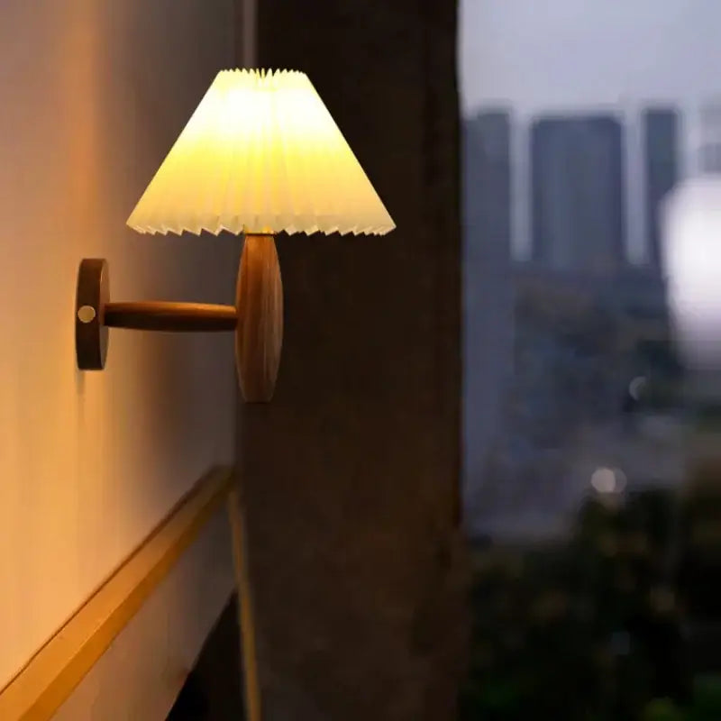 Warm-toned Japanese walnut wood wall lamp with cream pvc led pleated fabric shade for bedroom decorbites sconce