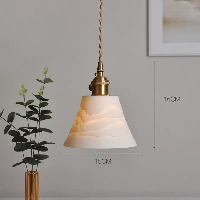 Japanese white fluted ceramic pendant light with textured mountain design and polished copper finish kitchen lighting