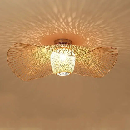 Japanese woven wave bamboo pendant chandelier with warm-toned lattice design and illuminated glass shade decorbites bamboo pendant