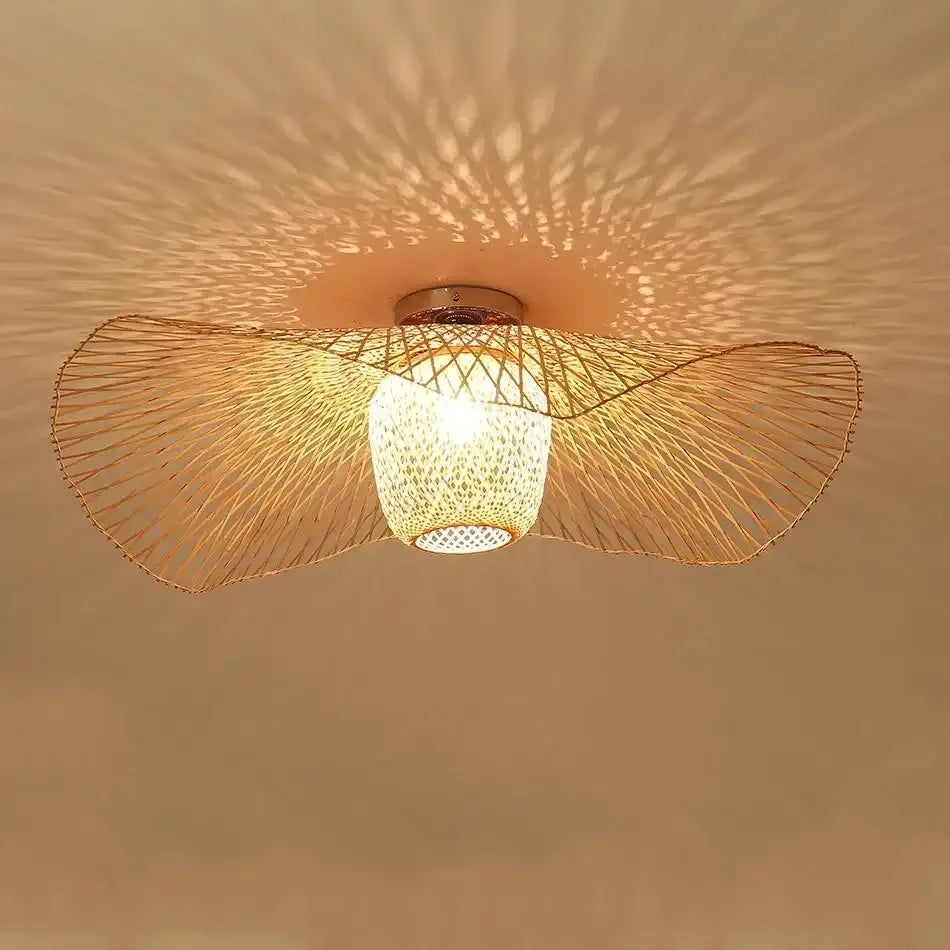 Japanese woven wave bamboo pendant chandelier with warm-toned lattice design and illuminated glass shade decorbites bamboo pendant
