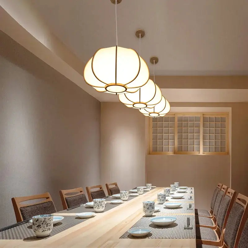 Warm softly glowing bamboo pendant lamp with wooden frame minimalist decorbites bamboo pendant for tea or living room