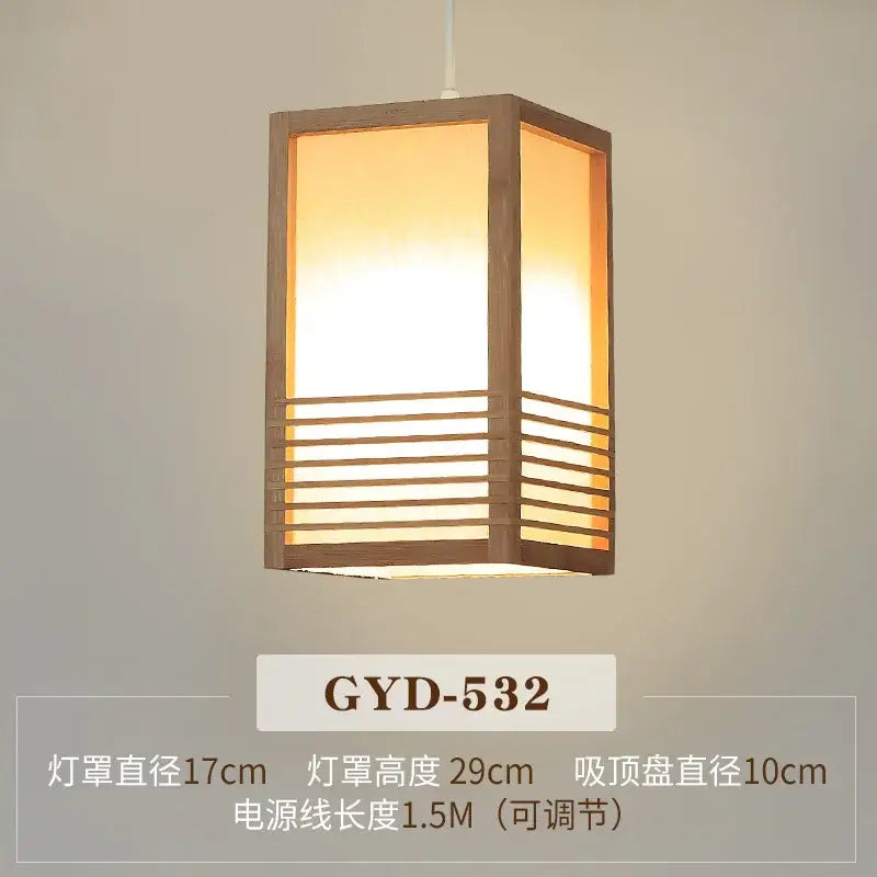 Warm-toned wooden decorbites bamboo pendant lamp with horizontal slats and soft glowing interior for tea room decor
