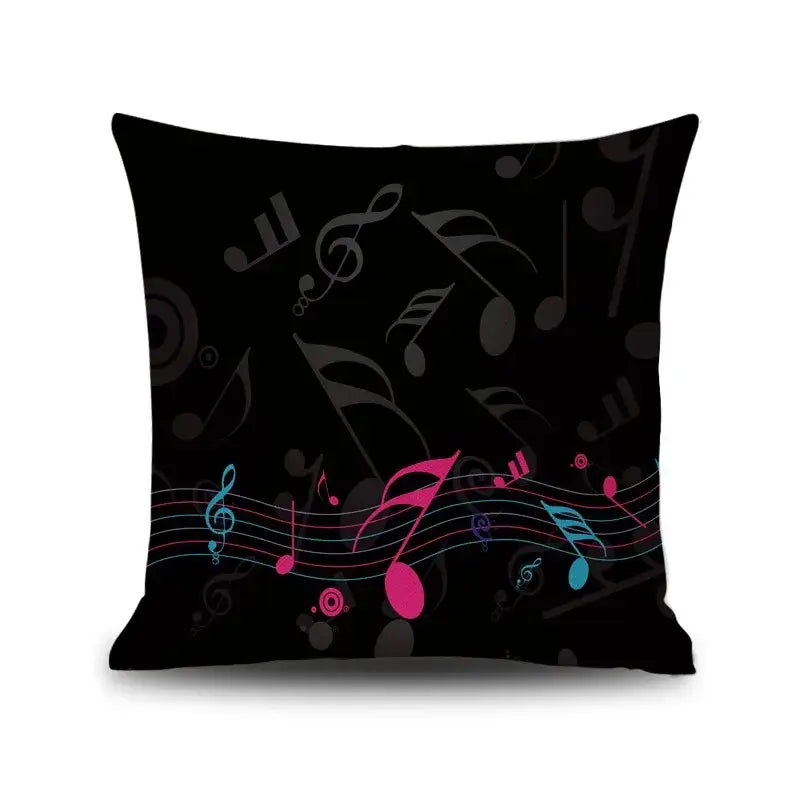 Black linen throw pillow with vibrant pink blue and gray notes piano graphic for living room decorbites letter notes