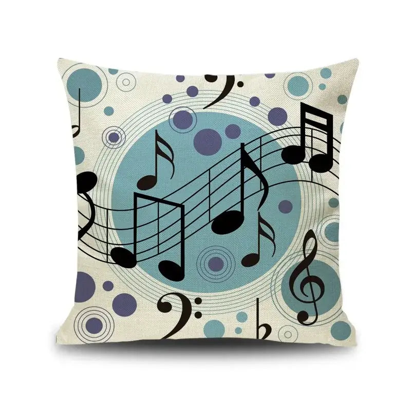 Beige linen throw pillow with black blue and purple notes piano graphic featuring jazz letter notes decorbites design