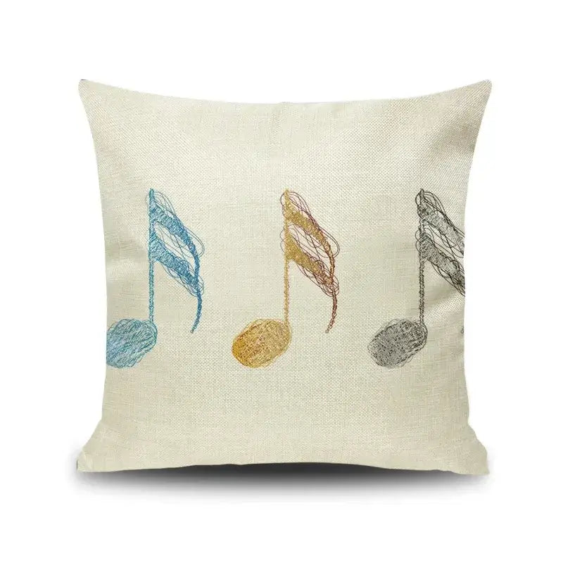Beige linen throw pillow with embroidered blue gold and gray musical notes for living room decorbites letter notes design