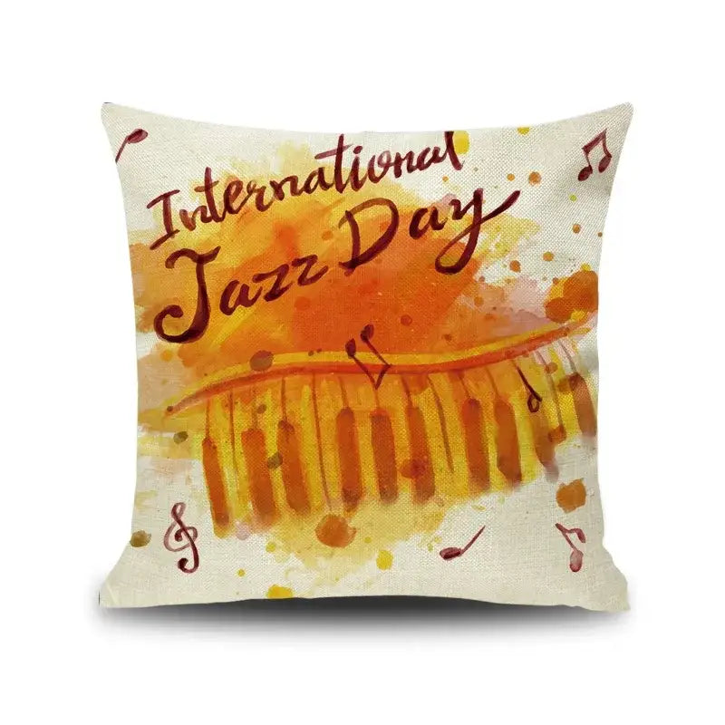 Square linen cushion cover with orange yellow letter notes piano graphic and international jazz day text decorbites letter notes