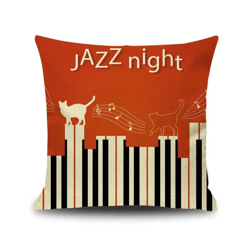 Orange linen throw pillow with jazz night text and letter notes piano graphic featuring cat silhouettes for decorbites decor