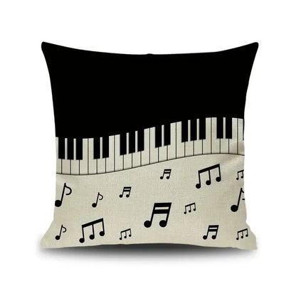 Black and cream linen throw pillow with letter notes piano graphic and scattered musical notes for living room decorbites decor