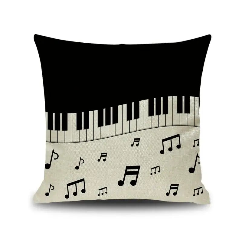 Black and cream linen throw pillow with letter notes piano graphic and scattered musical notes for living room decorbites decor