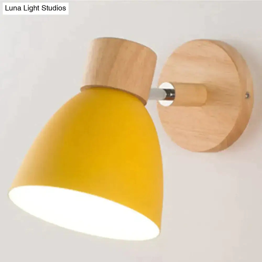 Joan wooden reading wall lamp with yellow conical shade and natural wood base for bedroom lighting