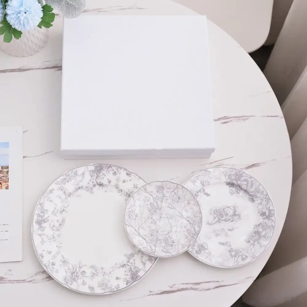 Set of three elegant white ceramic jungle bone plates with silver floral and animal motifs by decorbites jungle bone