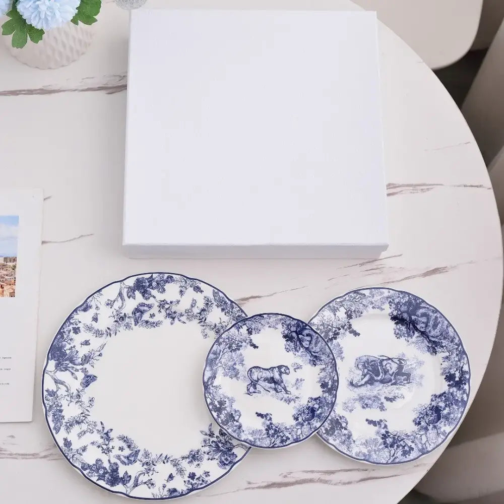 Set of three white ceramic jungle bone china toile animal plates with blue floral motifs and scalloped edges for dining room decorbites jungle bone