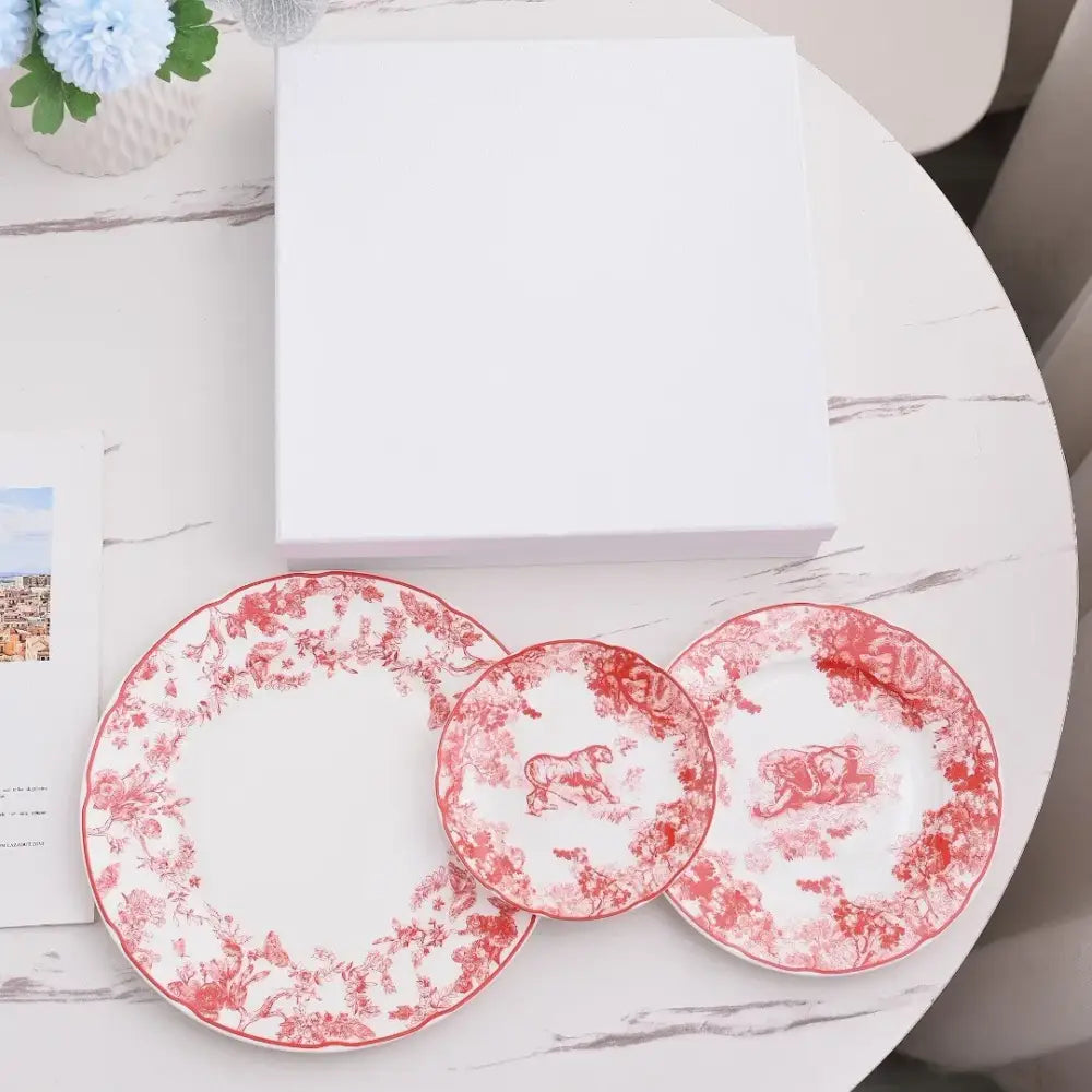 Set of three white ceramic jungle bone china toile animal plates with intricate red floral motifs for dining room decorbites jungle bone